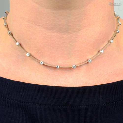 A brilliant-cut diamond collet and knife-edge bar necklace.E...