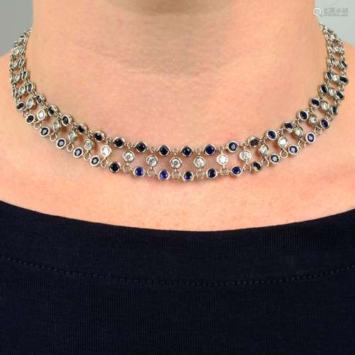 A sapphire and diamond necklace.