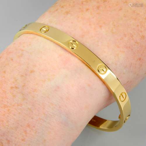 An 18ct gold 'Love' bangle, by Cartier.