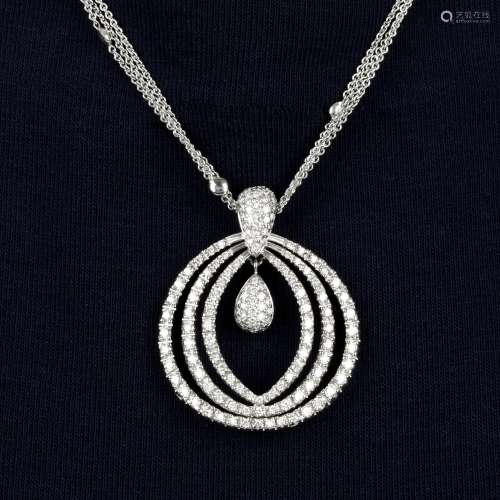 An 18ct gold pavé-set diamond pendant,
