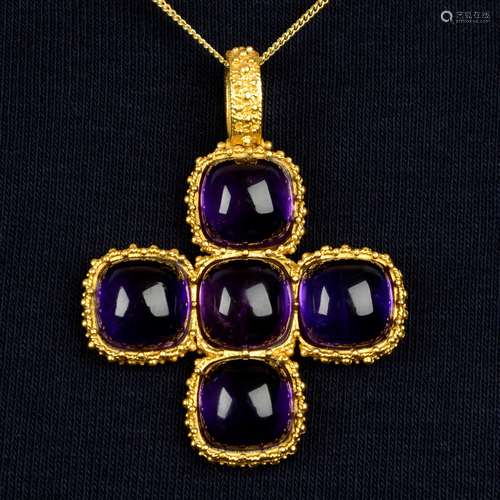 An amethyst cross pendant, by Ilias Lalaounis.