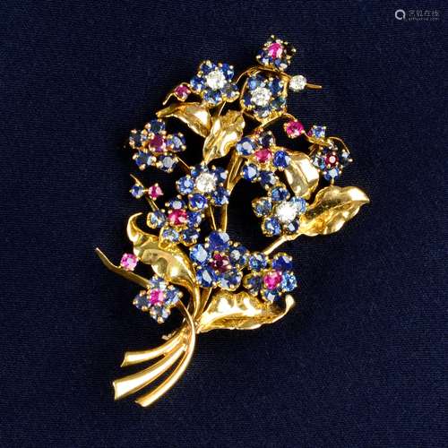 A mid 20th century 18ct gold sapphire, ruby and diamond flor...