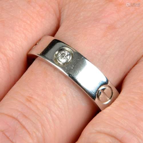 A platinum brilliant-cut diamond 'Love' ring, by Cartier.