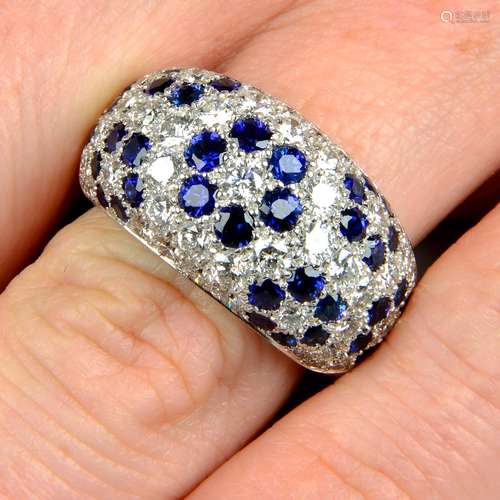 A pave-set diamond and sapphire floral bombe ring.Estimated ...