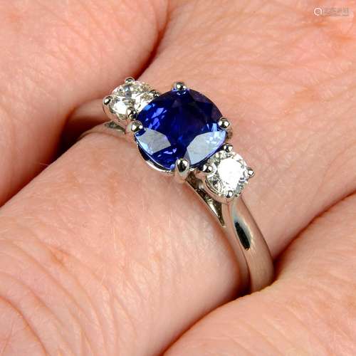 A platinum, sapphire and brilliant-cut diamond three-stone r...