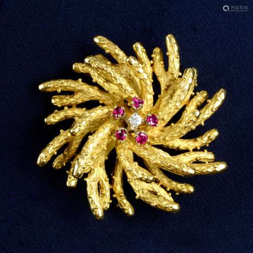 A 1960s 18ct gold ruby and diamond textured floral brooch,