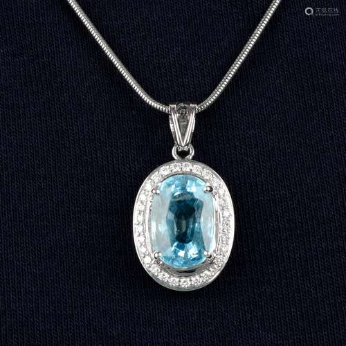 An 18ct gold aquamarine and diamond pendant,