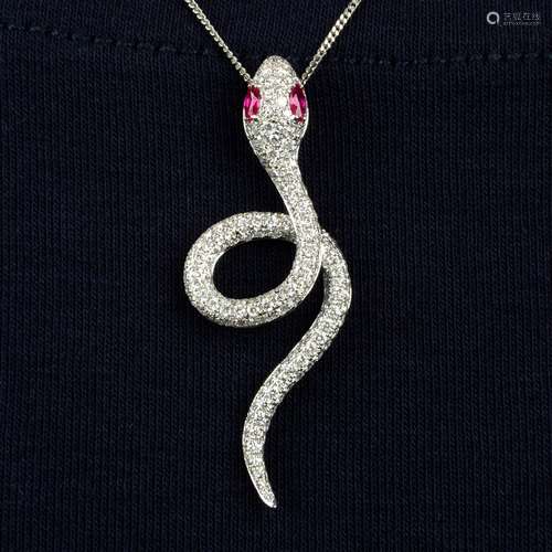 A pavé-set diamond snake pendant,