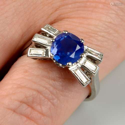 A mid 20th century platinum, Kashmir sapphire and baguette-c...