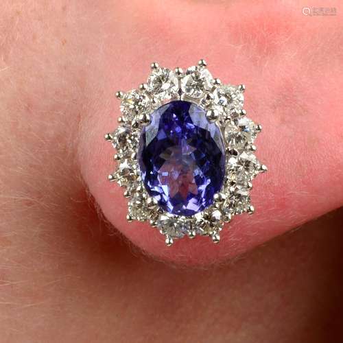 A pair of 18ct gold tanzanite and brilliant-cut diamond clus...