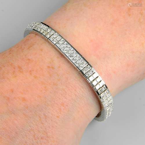 An 18ct gold square-shape diamond line bracelet.