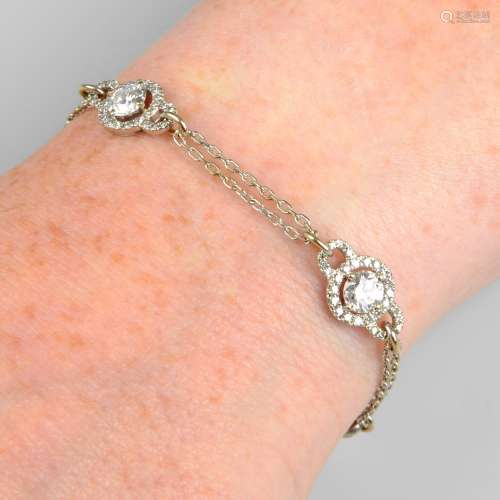 A brilliant-cut diamond cluster bracelet.Estimated total dia...