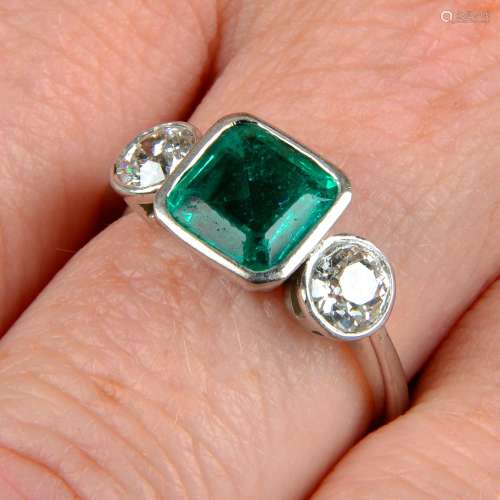 An 18ct gold emerald and old-cut diamond three-stone ring.Em...