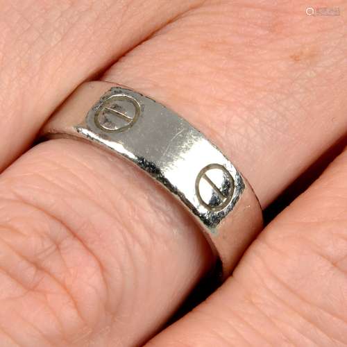 A platinum 'Love' ring, by Cartier.