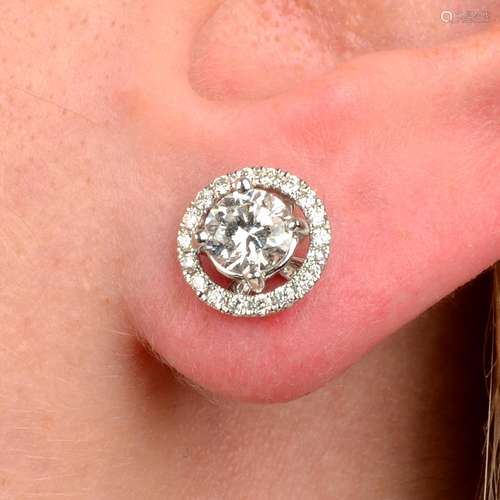 A pair of brilliant-cut diamond stud earrings,