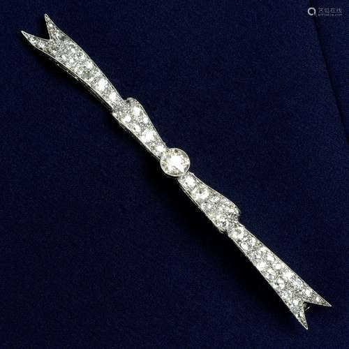 A mid 20th century platinum diamond ribbon brooch.