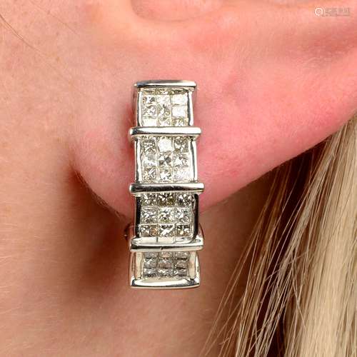 A pair of square-shape diamond half-hoop earrings.Estimated ...