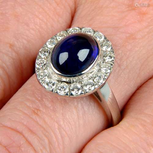 An 18ct gold sapphire cabochon and brilliant-cut diamond rin...