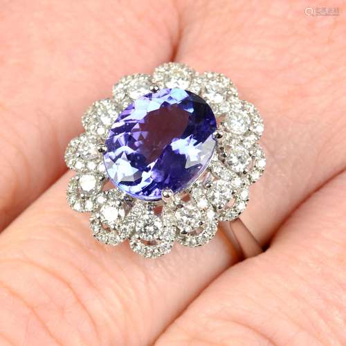 An 18ct gold tanzanite and diamond dress ring.Tanzanite weig...