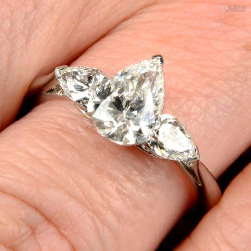 A pear-shape diamond three-stone ring.With report 1146953348...