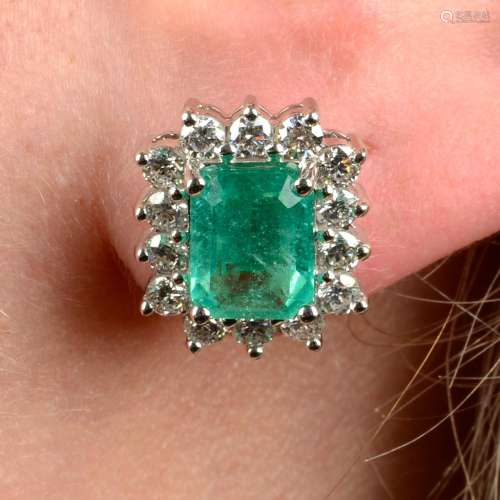 A pair of emerald and diamond cluster earrings.Emerald calcu...