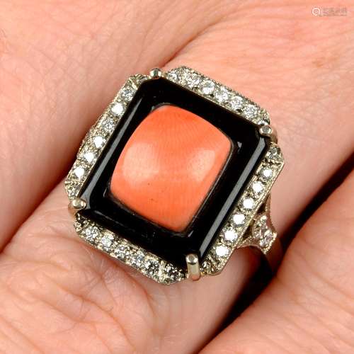 A coral, onyx and diamond dress ring.Estimated total diamond...