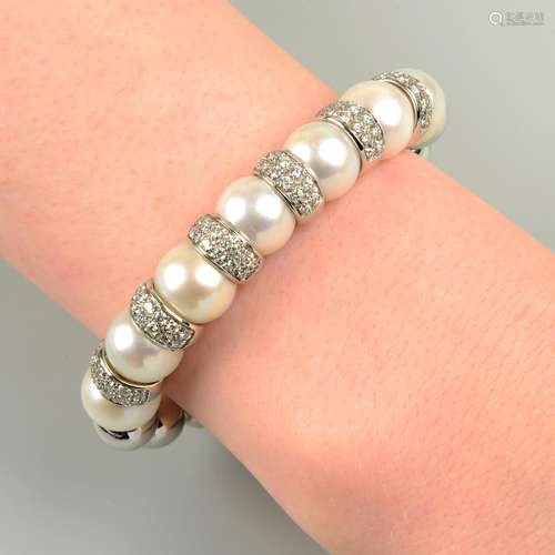 A cultured pearl and pavé-set diamond spacer cuff bangle.Tot...