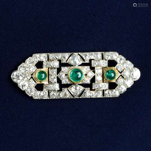 An Art Deco platinum and gold, emerald and diamond geometric...