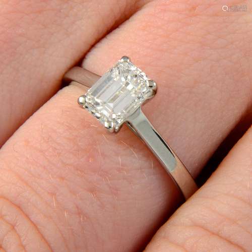 A platinum rectangular-shape diamond single-stone ring.Diamo...