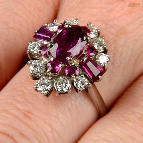 A vari-cut ruby and brilliant-cut diamond dress ring.Princip...