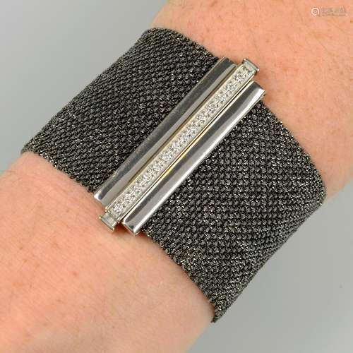 A woven bracelet, with pavé-set diamond clasp, by Carolina B...