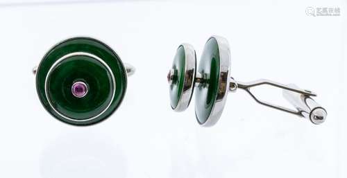 A pair of fine Imperial green jadeite cuff links, two gradua...