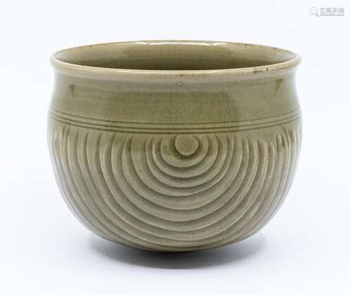 A Chinese northern celadon rice measure, 20th century, the r...