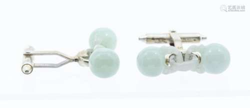 A pair of white jadeite interconnected ball cuff links, moun...
