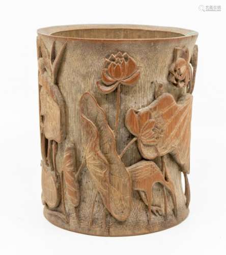 A Chinese bamboo lotus brushpot (Bitong), caved to the sides...