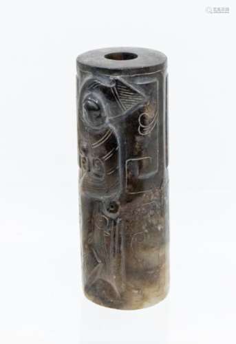 A Chinese pale celadon and brown ancient jade cylindrical be...