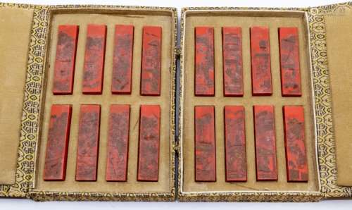 A set of sixteen Chinese cinnabar coloured ink sticks, each ...