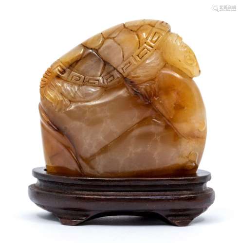 A white Tianhaung stone, carved with a turtle to the top, th...