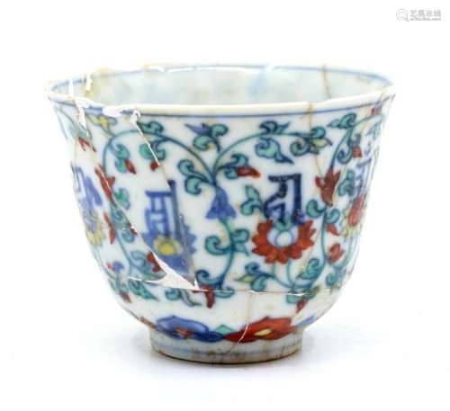 A Chinese doucai ‘lotus and lanca’ cup, the gently rounded s...
