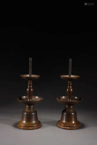 A Pair of Bronze Candlestick