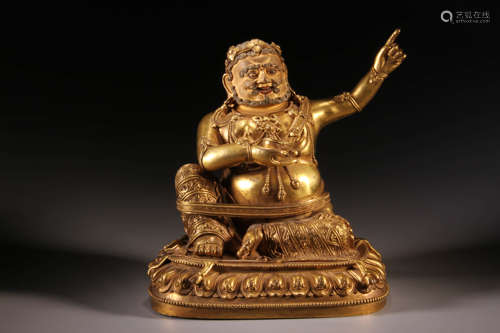 A Gilt Bronze Mahasiddha Figure Statue