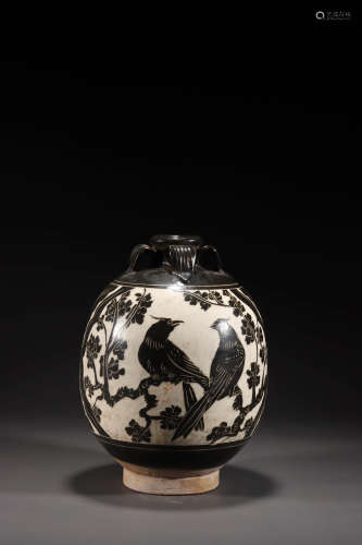 A Cizhou Kiln Carved Magpie with Flower Porcelain Jar
