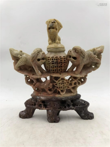 A CHINESE CARVED LIONS SHAPED STONE INCENSE CAGE