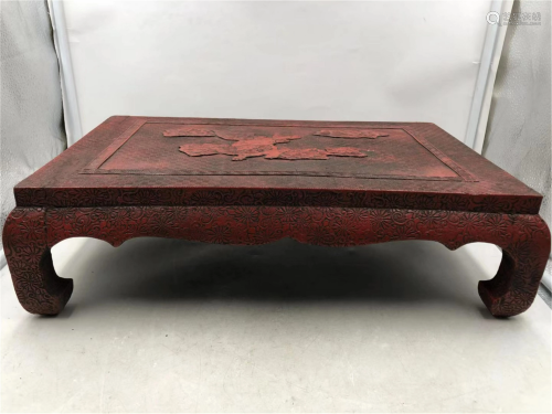 A CHINESE CARVED WOOD TEA TABLE
