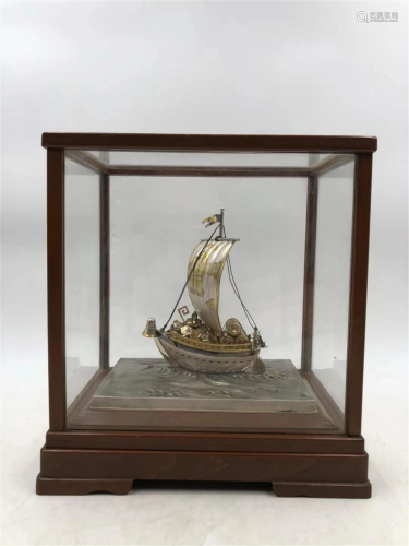 A CHINESE SILVER SAILING ORNEMANTS