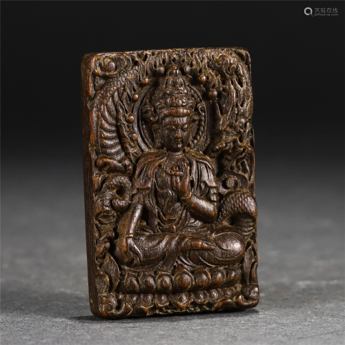 A CHINESE AGARWOOD BUDDHIST PLAQUE