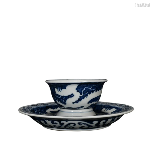 REVERSE-DECORATED BLUE & WHITE 'DRAGON' CUP AND SAUCER