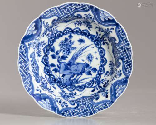 A CHINESE BLUE AND WHITE PHEASANT SOUP PLATE, KANGXI PERIOD ...