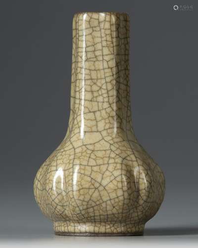 A CHINESE GU-TYPE CRACKLE GLAZED BOTTLE-VASE, QING DYNASTY (...