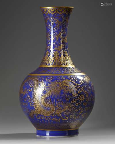 A CHINESE POWDER BLUE AND GILT BOTTLE VASE, QING DYNASTY (16...